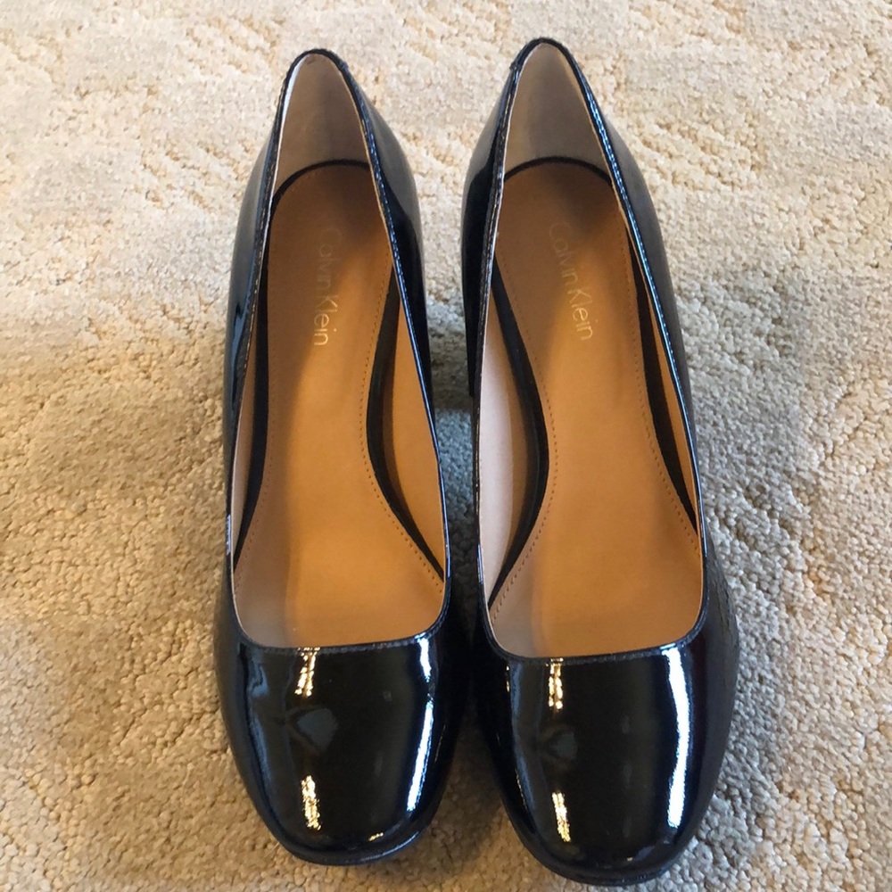 Calvin Klein black patent pumps